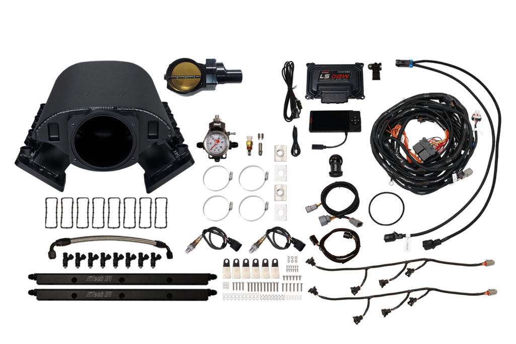 A collection of automotive or mechanical parts and tools laid out systematically.