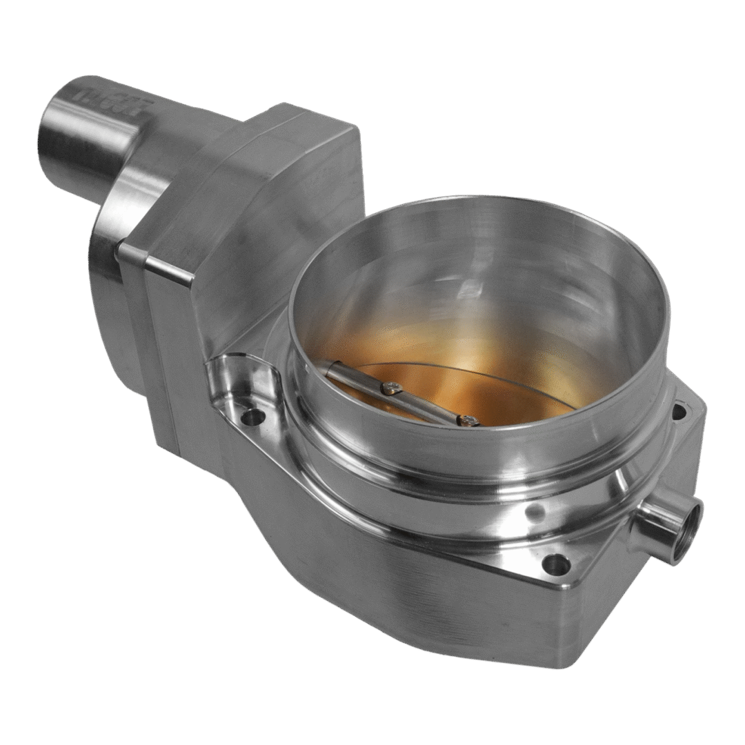 Close-up of a metal throttle body automotive part.