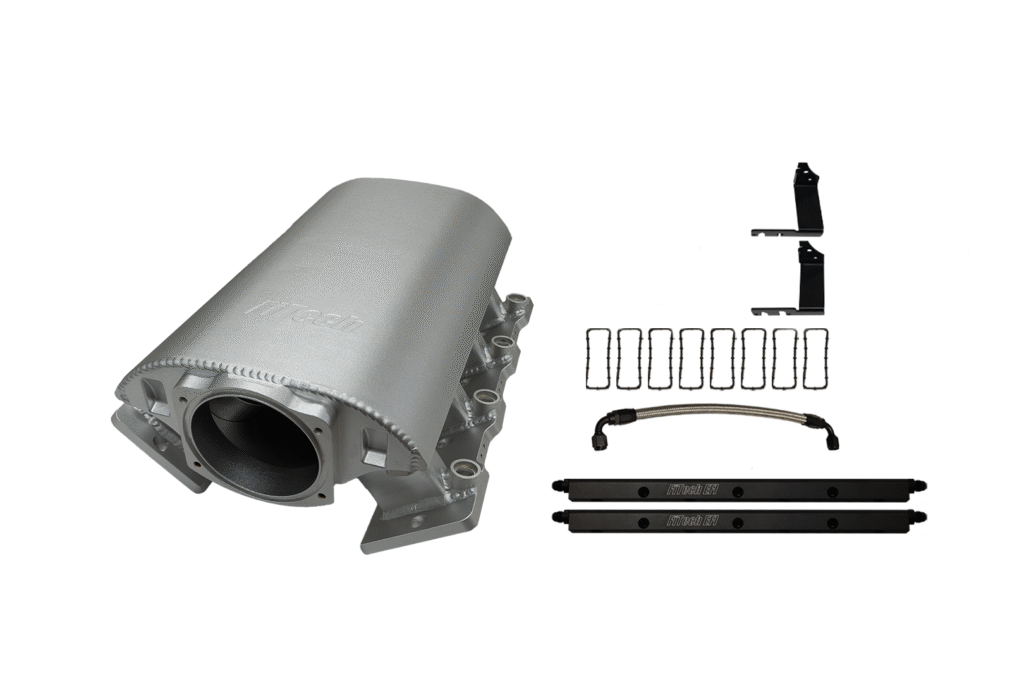 Automotive intake manifold with gaskets and hardware components.