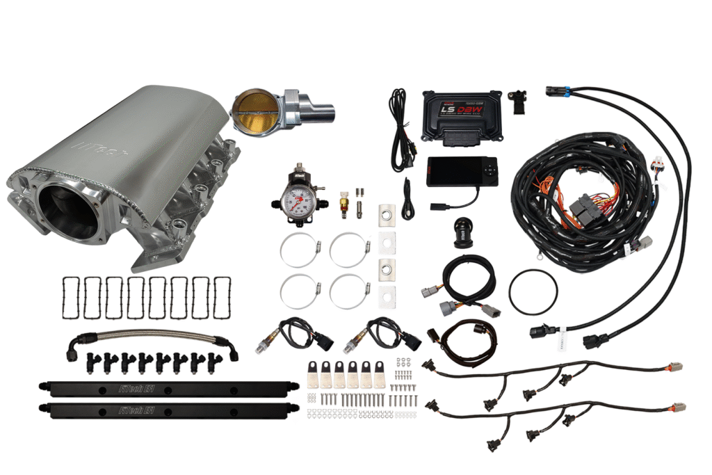 Complete car engine wiring and component kit laid out on white.
