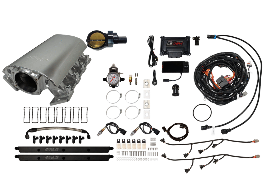 Complete fuel injection system kit with wiring and components.