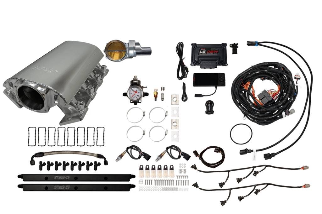 Car engine parts and wiring components laid out on a white background.