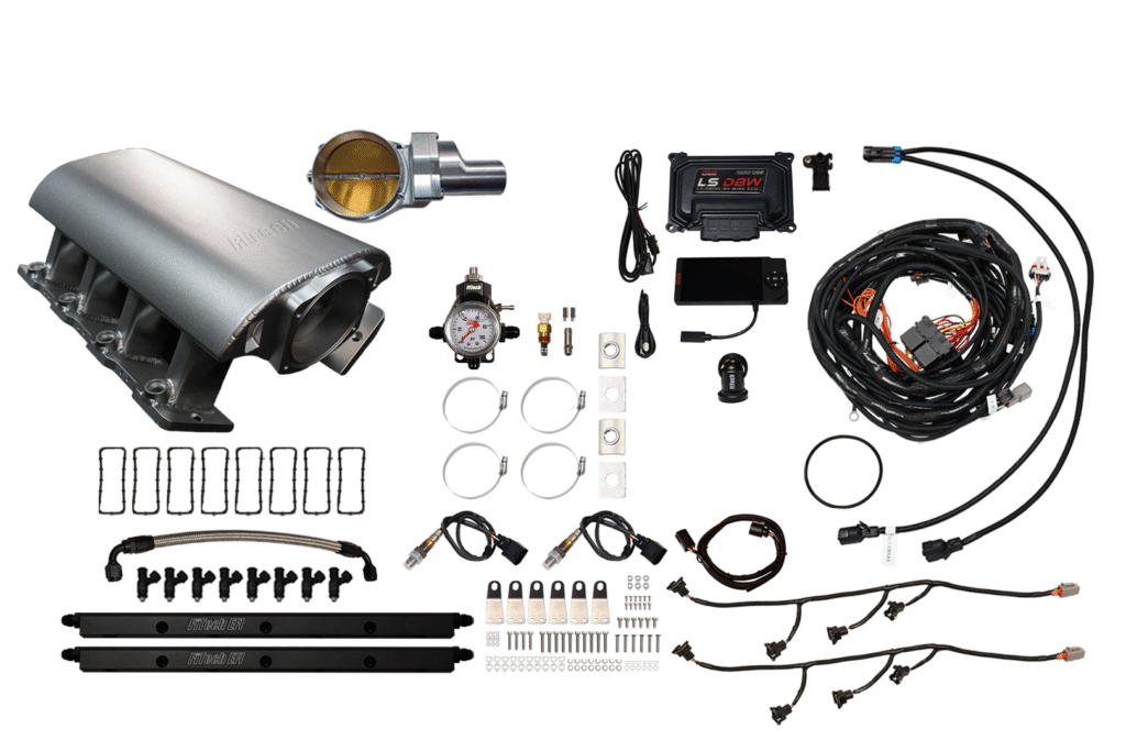 Car turbocharger kit with various components and wiring laid out on a white background.