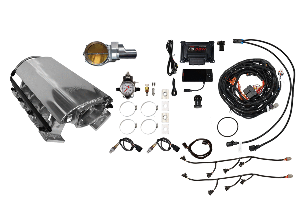 Complete fuel injection system kit with wiring and components.