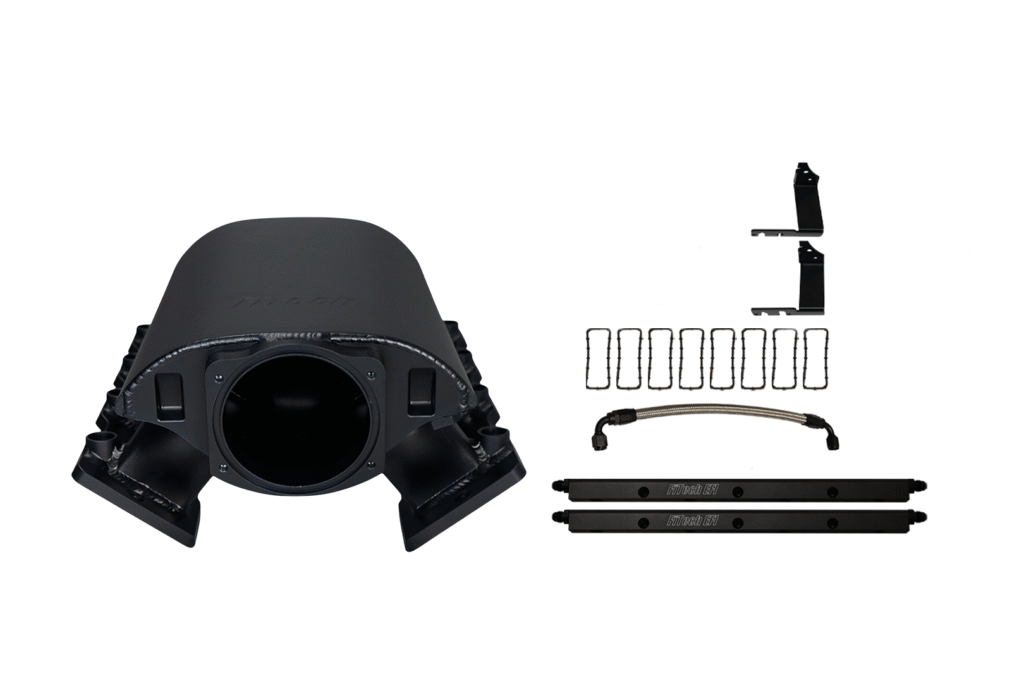 Black plastic mechanical or electronic device parts arranged neatly on a white background.