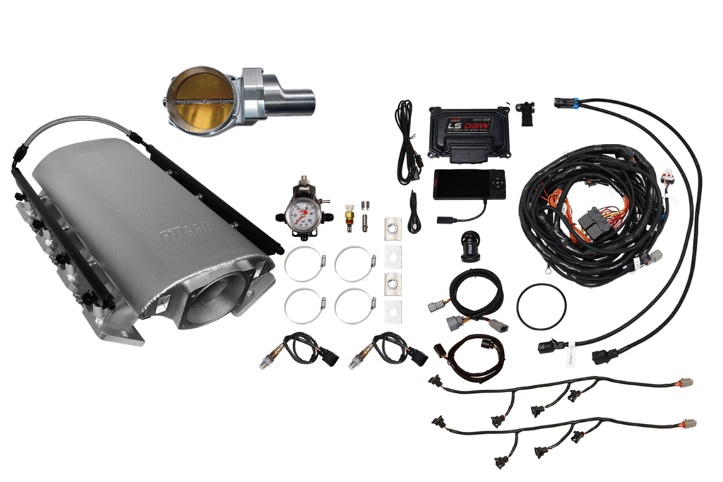 Components of a vehicle propane fuel system kit laid out.