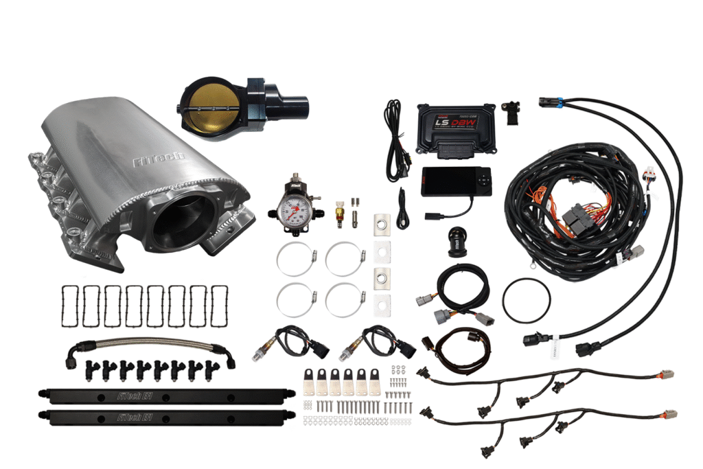 Comprehensive diesel engine tuning and performance parts kit with sensors and wiring.