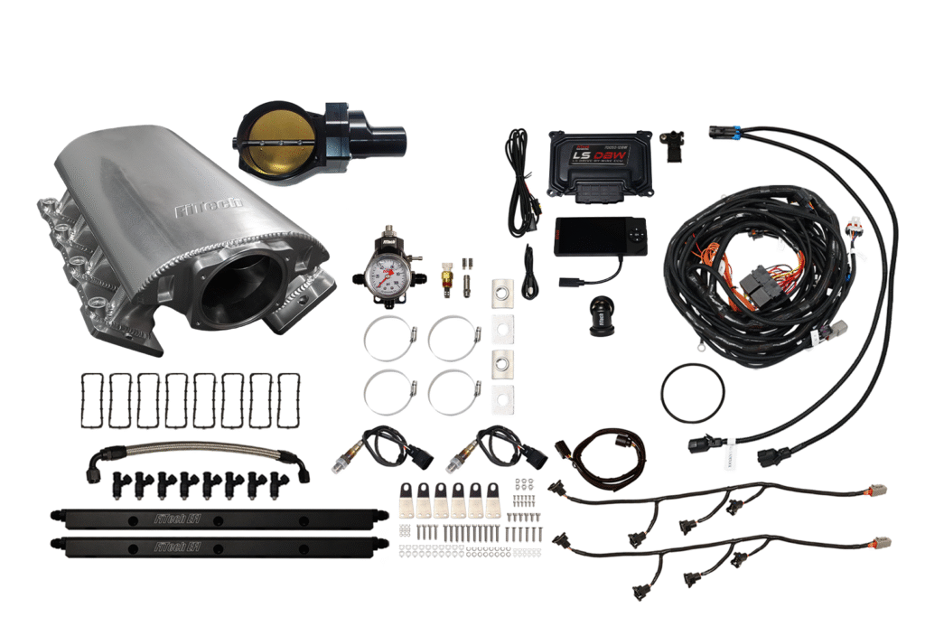 Car exhaust system and electronic components laid out neatly.