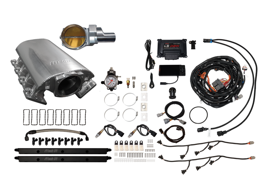 Complete exhaust system kit with various components and wiring.