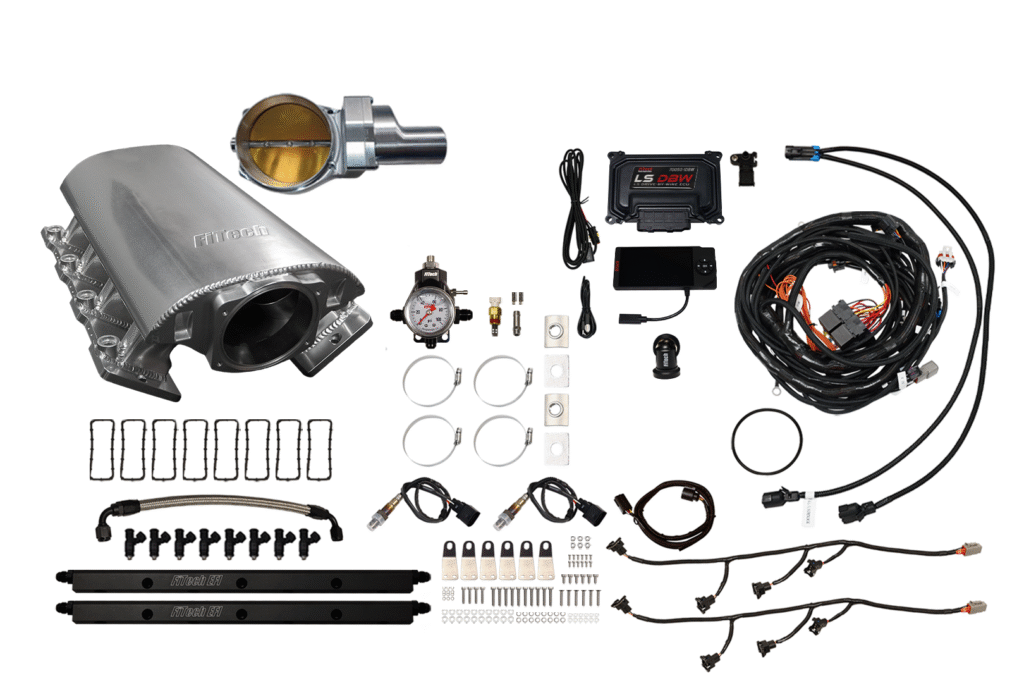 Car exhaust and engine tuning components laid out on a white background.