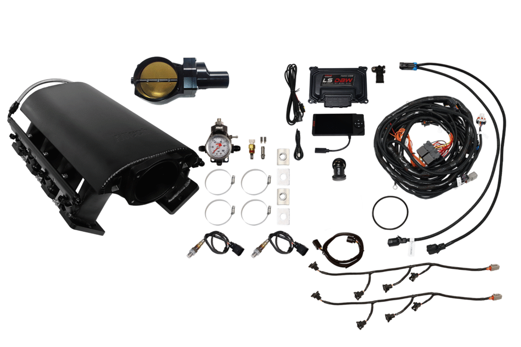 Complete automotive wiring harness kit with connectors and tools.