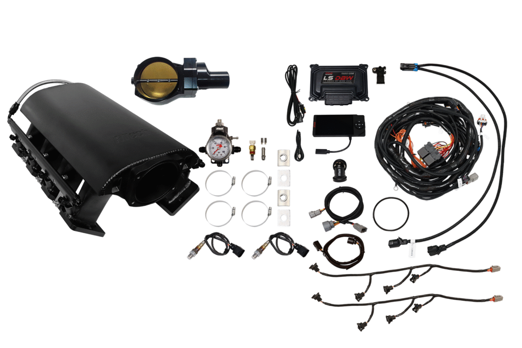 A car turbocharger kit with various components and wiring.