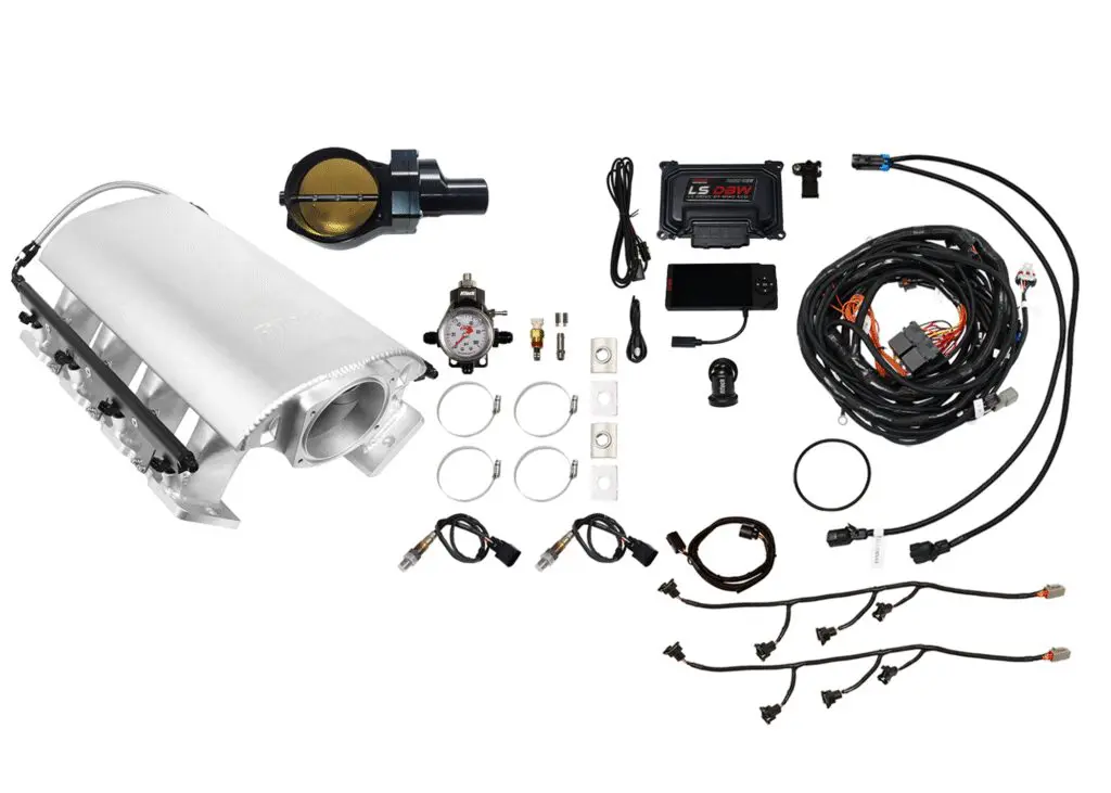 Complete turbocharger kit with various components and wiring.