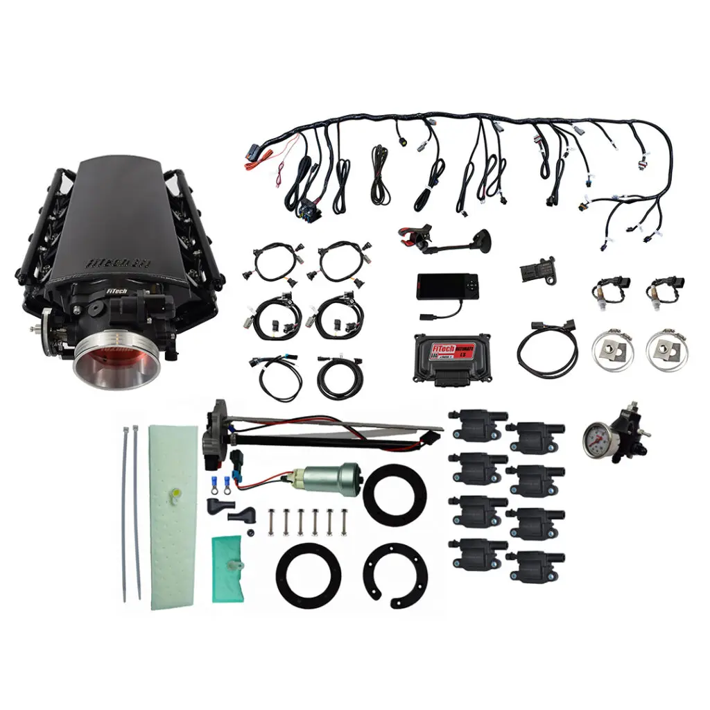 Complete automotive engine wiring harness kit with connectors and components.