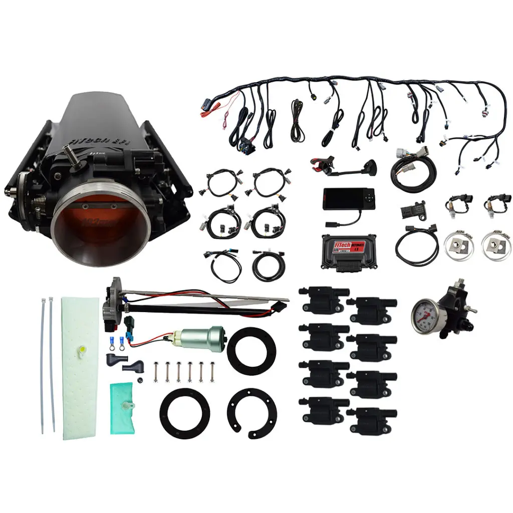 A disassembled camera with various lenses and accessories laid out.