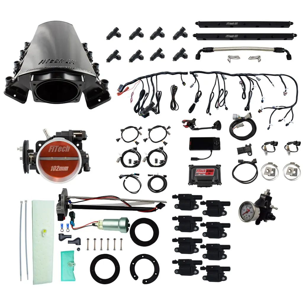 Complete automotive turbocharger installation kit with various components and clamps.