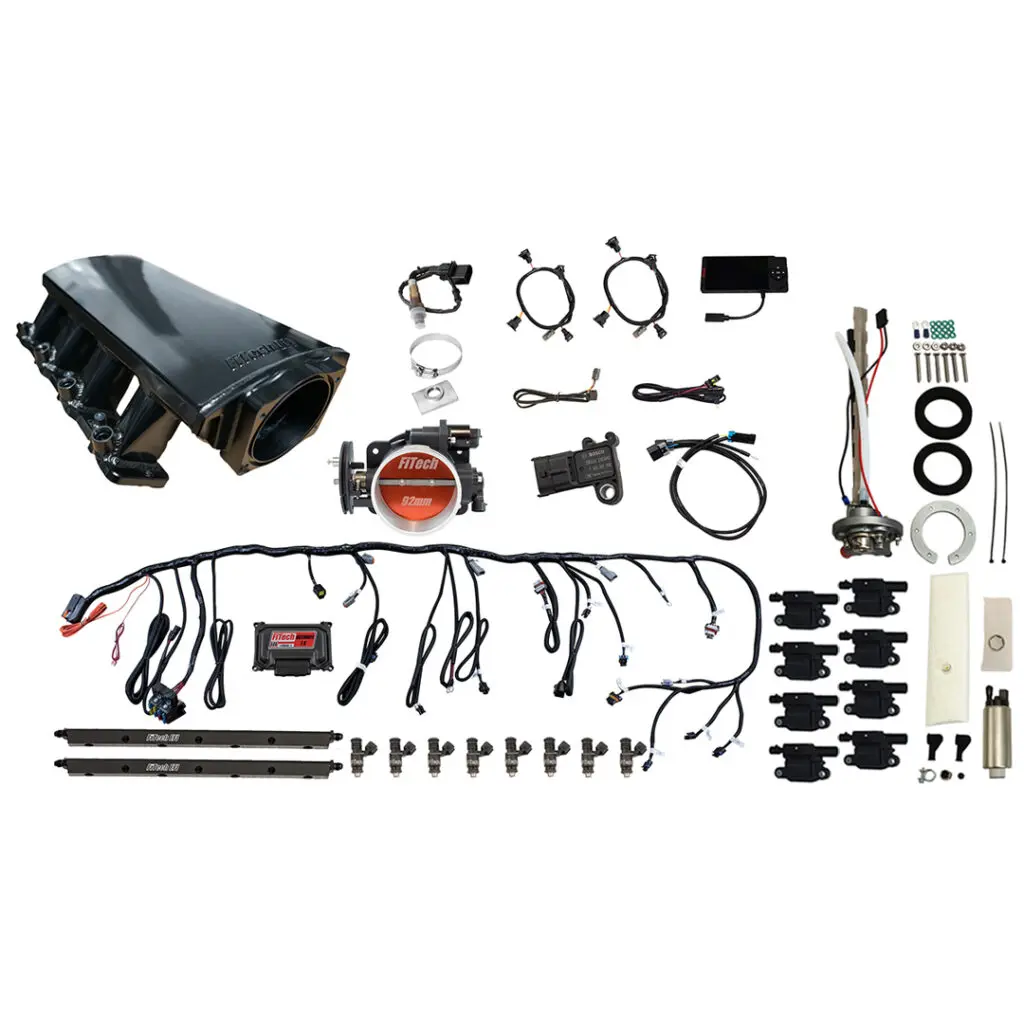 A collection of automotive parts and components laid out systematically.