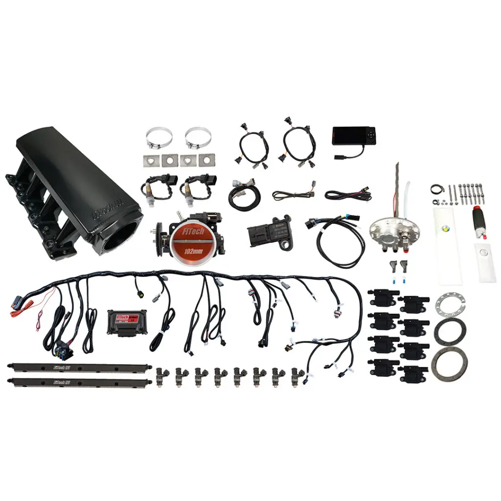 Complete car alarm system kit with various components and wiring.