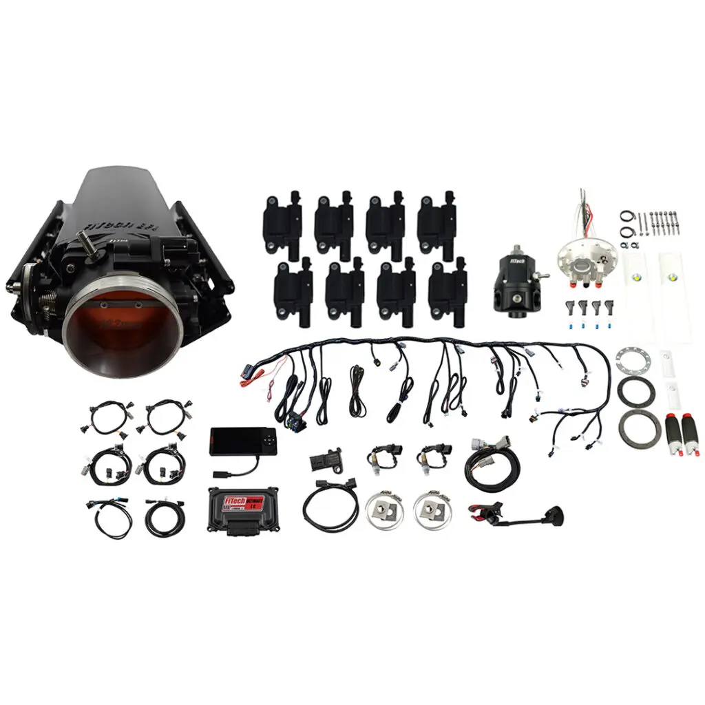 Complete car engine wiring harness kit with connectors and components.