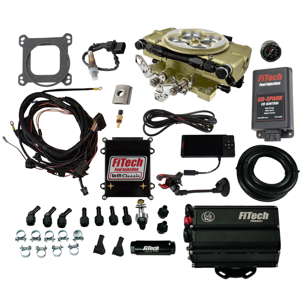 Complete fuel injection system kit with various components and wiring.
