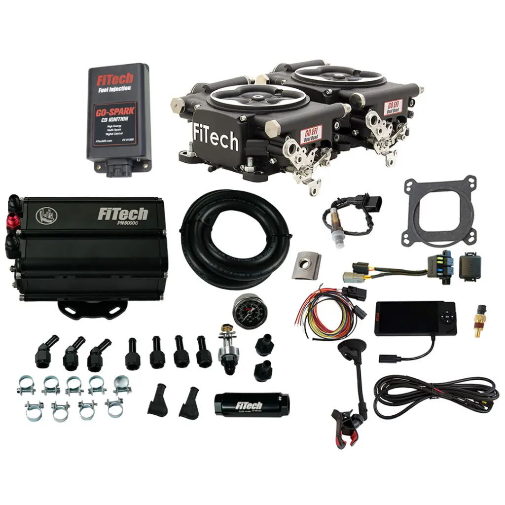 Complete electronic fuel injection kit with hardware and wiring.