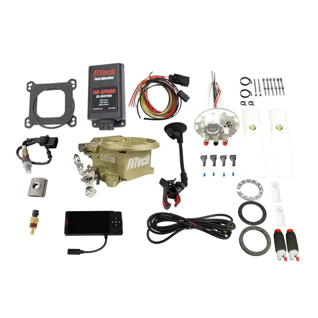 Complete carburetor rebuild kit with various components and tools.