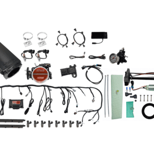 Car engine parts and accessories laid out.