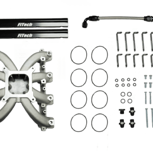 Car engine manifold and parts on display.