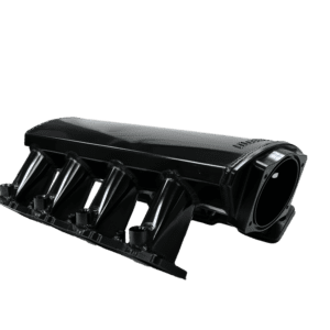Black car engine intake manifold on black background.