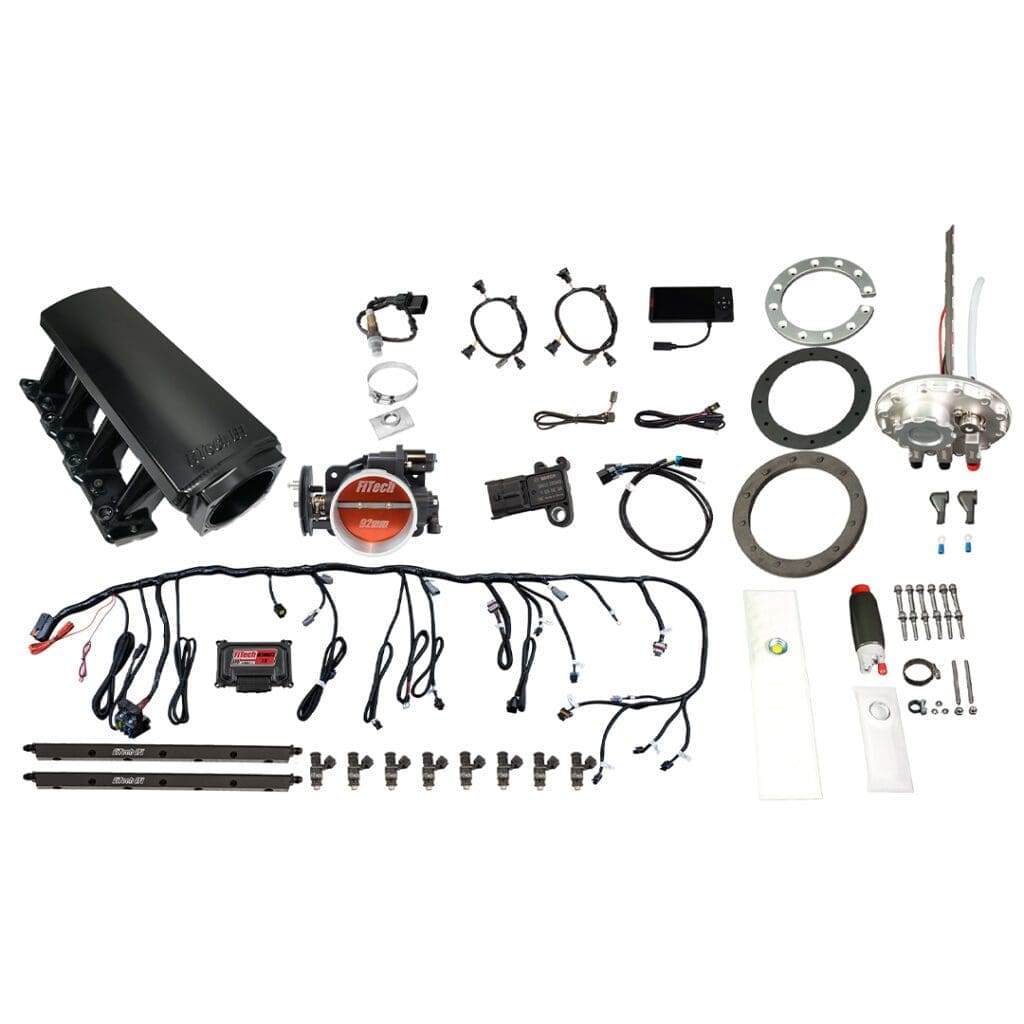 Electronic fuel injection kit components laid out.