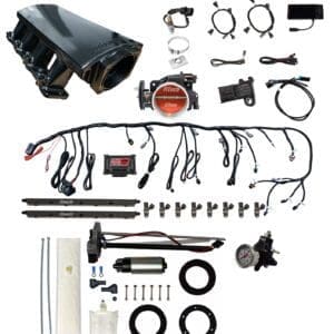 Car engine parts and wiring kit displayed.