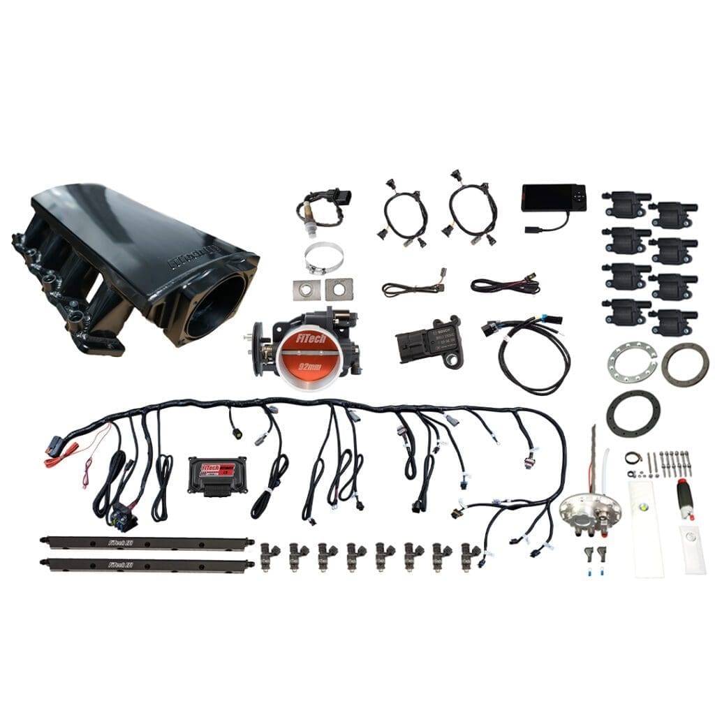 Car engine components and wiring kit displayed.