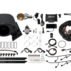 Automotive engine parts and wiring kit displayed.