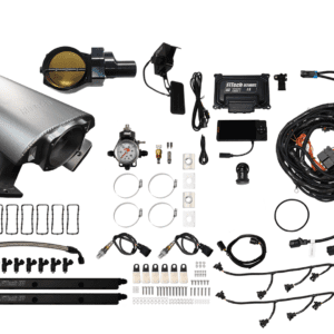 Car engine parts and accessories kit laid out.