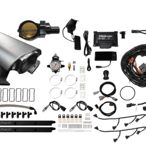 Car engine parts and wiring components displayed.