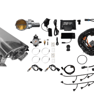 Car engine components laid out on display.