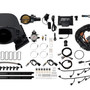 Car engine components and wiring kit displayed.