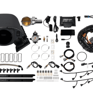 Car engine components and wiring kit displayed.