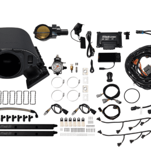 Car engine parts and wiring kit displayed.