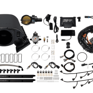 Car engine parts and wiring kit displayed.
