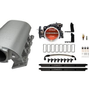 Car engine intake manifold with fuel injectors and related components.
