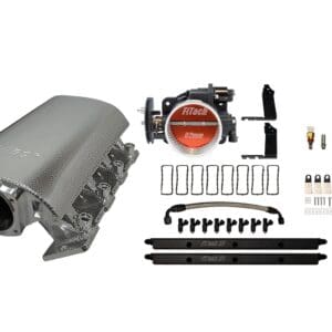 Car engine intake manifold with installation hardware laid out.