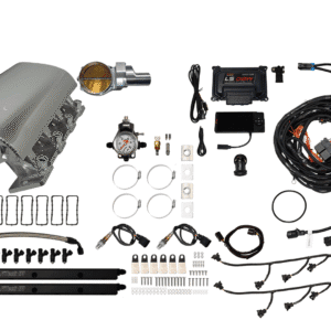 Complete automotive engine wiring and sensor kit laid out on white.
