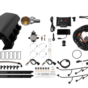 A disassembled automotive turbocharger kit with various components.