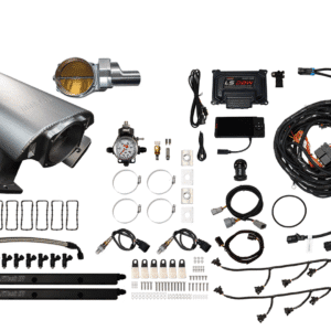 Car turbocharger kit with various components and wiring.