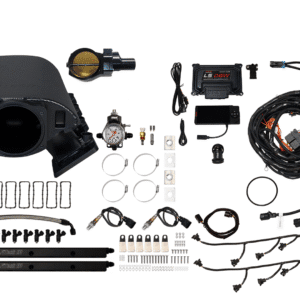 Complete car turbo kit with various components and wiring.