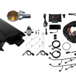 Components and wiring for a car turbocharger system laid out.