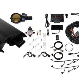 A car turbocharger kit with various parts and wiring components.