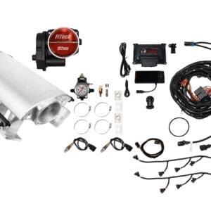 A disassembled turbocharger kit with various components and wiring.