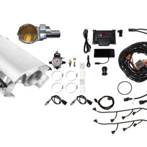 Complete car engine turbo kit with various components laid out.